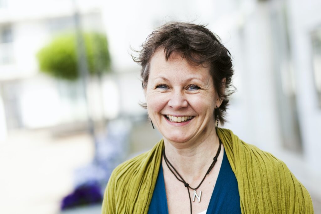 Portrait of mature woman smiling outdoors