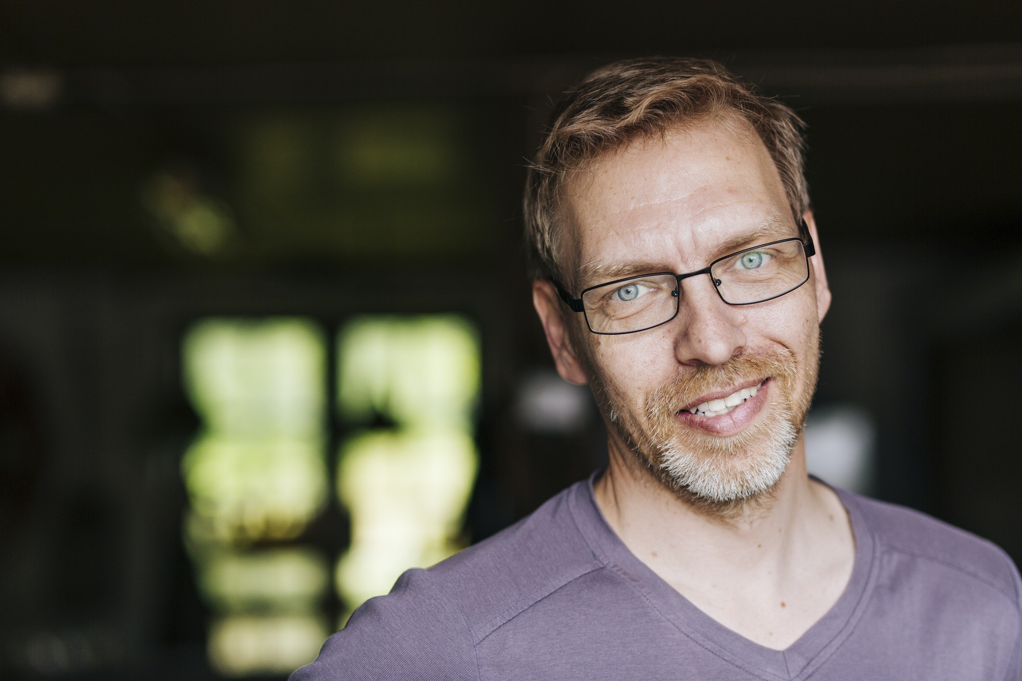 Portrait of smiling man wearing eyeglasses