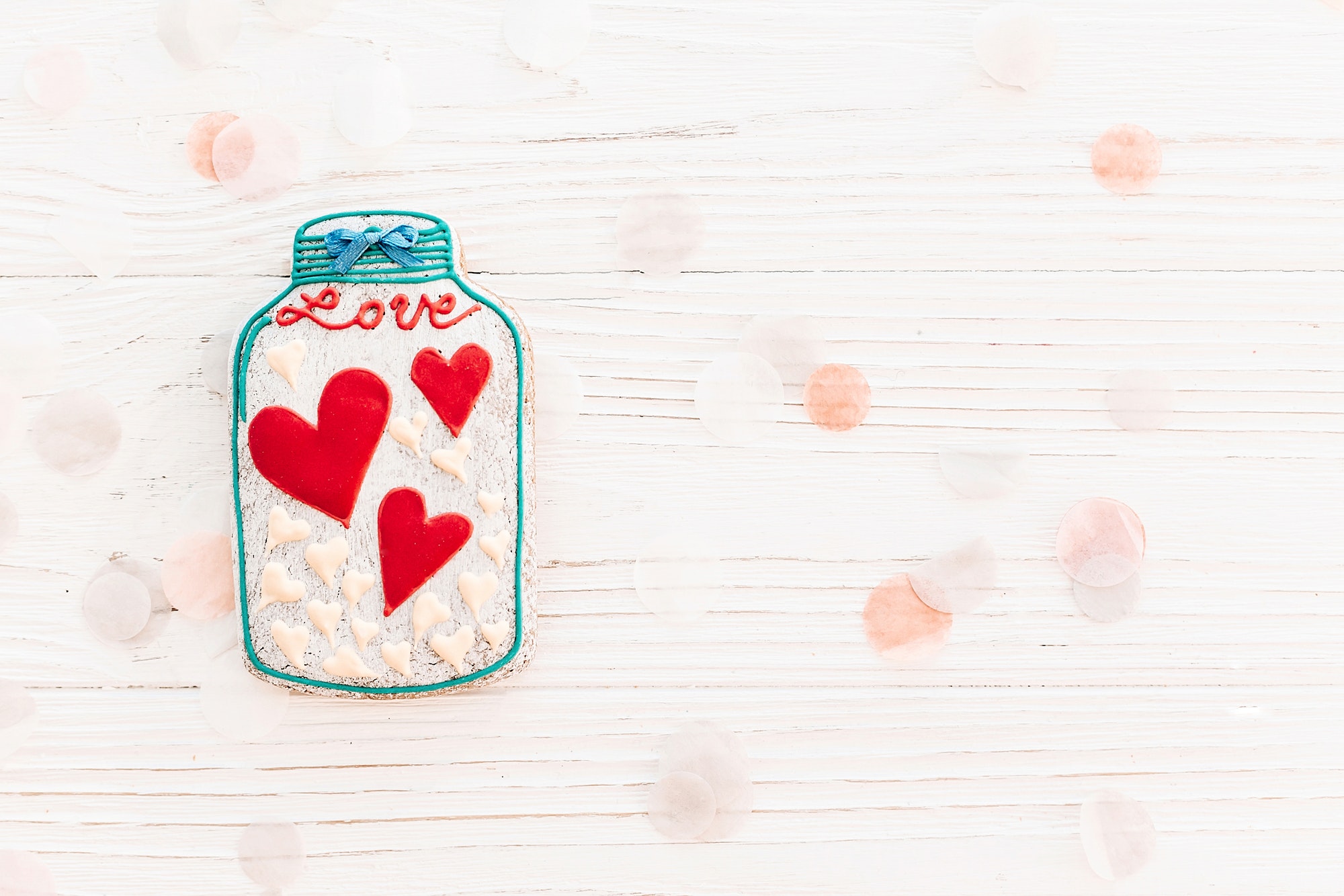 jar with colorful cookie hearts