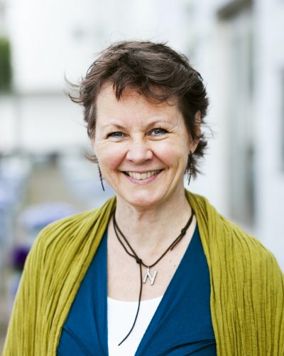 Portrait of mature woman smiling outdoors